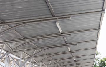 installing Red Pits metal roofing